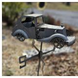 Metal car-shaped weather vane with directional indicators; measures 41" Tall 