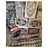 Group of holiday ornaments including hand painted and sparkling creations