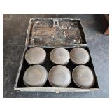 A vintage spice box with tin containers. 