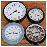 Four clocks including AcuRite with thermometer feature 