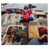Group of NASCAR memorabilia including jackets, posters, and fan club items