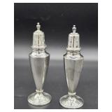 Pair of sterling silver salt and pepper shakers marked 846 weighing at 82.79 grams.