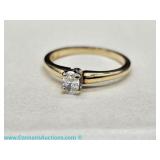14K yellow gold ring with a brilliant cut diamond at a VS1 and color E. 