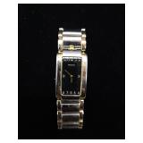 90s to early 2000s Movado quartz watch with stainless steel and gold tone bracelet. Please preview f