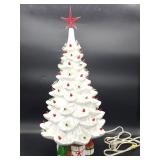 Ceramic Christmas tree with red and green decorations and presents at the base, measures 16" x 8"