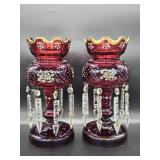 Victorian style ruby red art glass mantle lustre set dating to the late 19th century with scalloped 