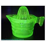 Vintage Uranium glass citrus juicer with measuring cup marked in ounces and pints; measures 16" oz