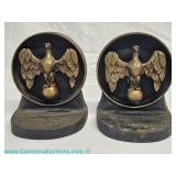 Pair of very heavy cast iron bookends with eagle motif from the late 20th century; measures 6" x 4" 