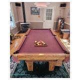 Traditional-style Olhausen pool table produced in 1995 with an Original Italian Slate bed, oak-grain