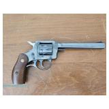 H&R Model R92 .22 LR revolver with blued finish, wood grips, and serial number NC017027, marked H&R 
