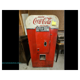 A Vendo Company V-80 American mid-century Coca-Cola bottle vending machine from the 50s features a r