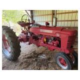 Kubota with loader, JD round bailer, square bailer, many other implements and barn items.