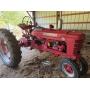 Kubota with loader, JD round bailer, square bailer, many other implements and barn items.