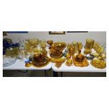 Vintage amber glass dishware, primarily identified as the "Whitehall" or "Cubist" pattern produced b