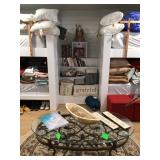 Books, decorative pillows, oval table & area rug
