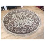 Area rug 73” dia./ not including the fringe 