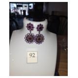 Purple flower like earrings