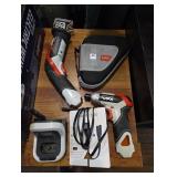 Black& Decker drill, hand saw with charger, case, and cord 