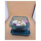 Round bath bombs in plastic container
