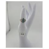 Ring with blue/green inset