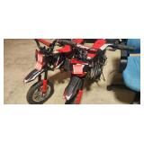2 Dirt bikes one works and has a charger one needs a battery