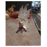 Eagle glass on tree twig