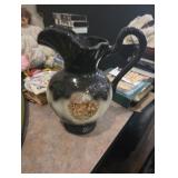 Vintage water pitcher with deer