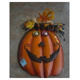 Cute metal pumpkin wall decor