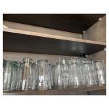 Shelf of Clear Glass 8 oz Drinking Glasses