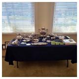 Silver plate and sterling silver serving ware and accessories, pieces dating to the 1850s