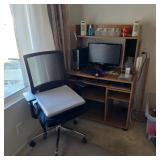 Office chair, computer desk, desktop computer with monitor