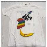 Lot # : 110 - 1985 Live Aid "This Shirt Saves Lives" Concert Tee