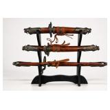 Set of Three Decorative Swords with Stand