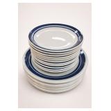 Stacked White Plates with Blue Rims
