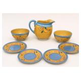 Yellow and Blue Ceramic Pitcher with Bowls and Plates