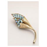Gold-Tone Floral Brooch with Blue Stones