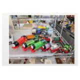 Assorted Toy Trains and Train Cars