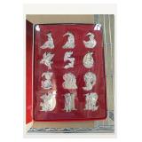 Twelve Silver-Tone Animal Figurines in Red Display Box