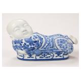 Blue and White Ceramic Reclining Baby Figurine