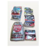 Assorted Die-Cast NASCAR Model Cars in Packaging