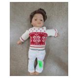 Doll With Red and White Sweater