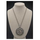 Ornate Metal Pendant Necklace With Coin Center