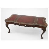 Ornate Wood and Red Leather-Top Coffee Table