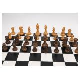 Wood Chess Pieces With Black and White Board