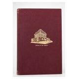 Maroon Hardcover Book With Gold Embossed Building