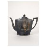 Metal Teapot With Ornate Design