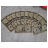 Twelve 1935â€“1957 $1 Silver Certificates
