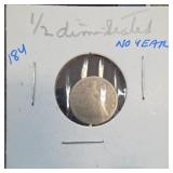 Unidentified Round Metallic Piece in 2x2 Holder