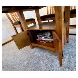 Dining room table storage area