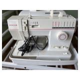 Singer portable sewing machine, model 9015 T